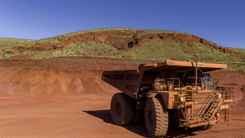 The group has indicated it will pull back spending in iron ore and green energy plans. 

