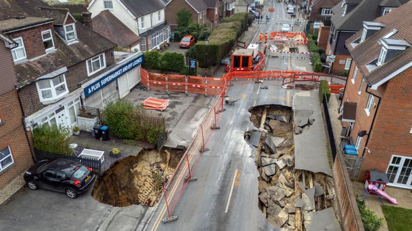 An aerial photograph shows the sinkholes in Godstone, England. 