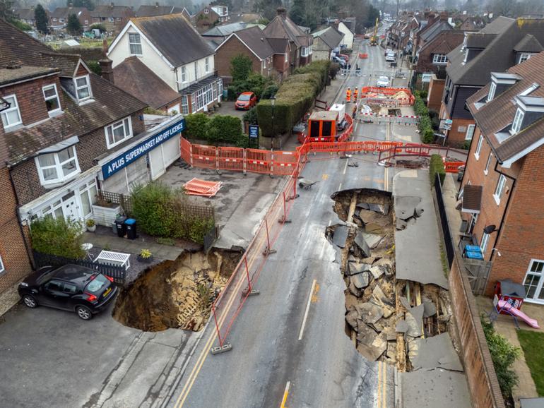 An aerial photograph shows the sinkholes in Godstone, England. 