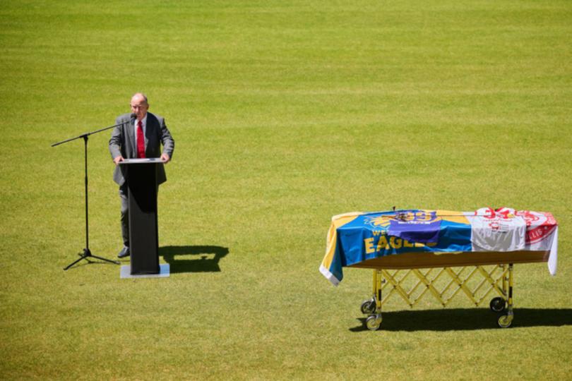 Trevor Nisbett delivers his eulogy during the funeral.