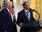 Gold legend Tiger Woods speaks alongside US President Donald Trump during a reception honouring Black History Month a the White House.