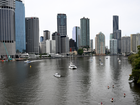 A woman has died after being pulled from the Brisbane River early on Saturday morning.