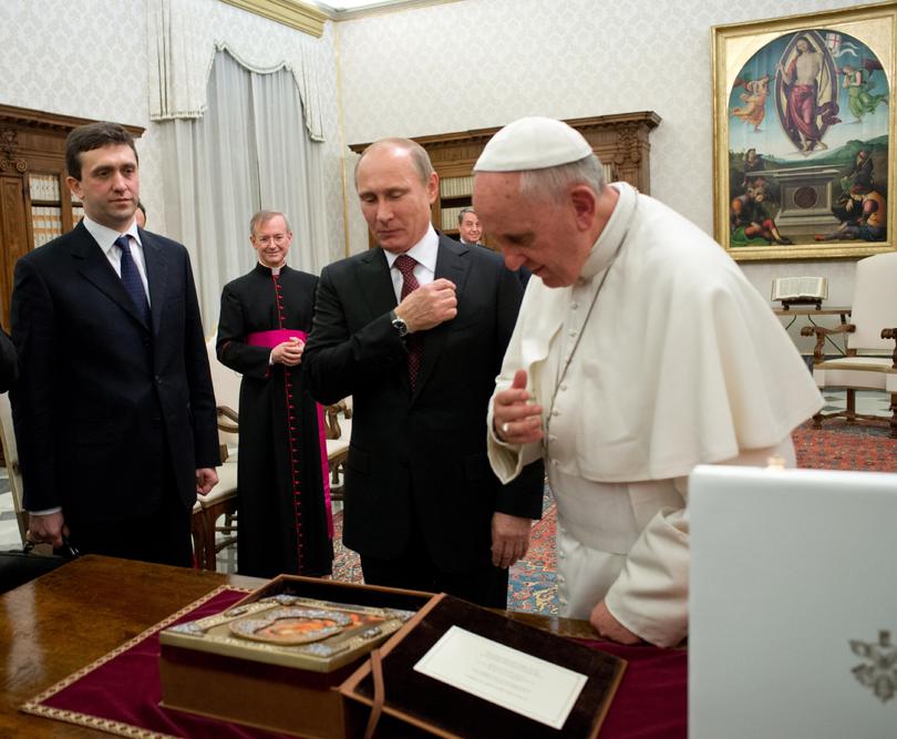 Russian President Vladimir Putin and Pope Francis.