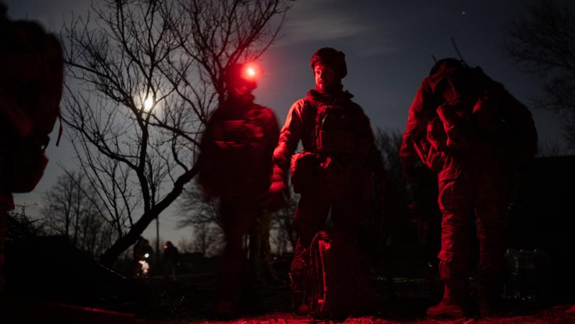 Ukrainian soldiers prepare weapons and ammunition before launching an assault on Russian soldiers in eastern Ukraine, Feb. 14, 2025. Europeans are debating additional funding and contemplating troops in Ukraine as American support appears ever more at risk. 