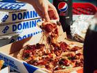 The embattled pizza maker booked $115.6m in one-off costs, with impairments on corporate stores to be closed making up $80.6m.

