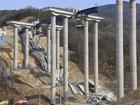 Structures supporting a highway bridge in South Korea collapsed after being put in place by a crane. (AP PHOTO)