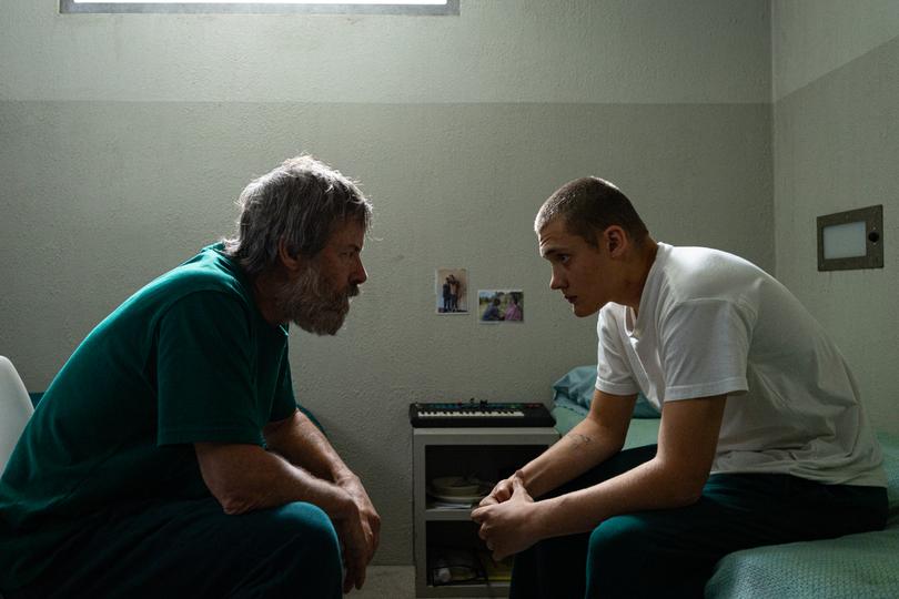 Guy Pearce and Vincent Miller in Inside.