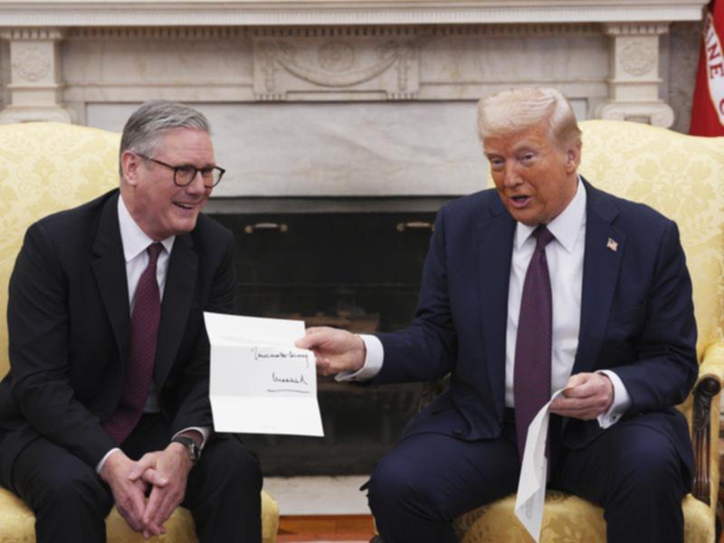 UK Prime Minister Keir Starmer hand delivered US President Donald Trump's state visit invitation. (AP PHOTO)