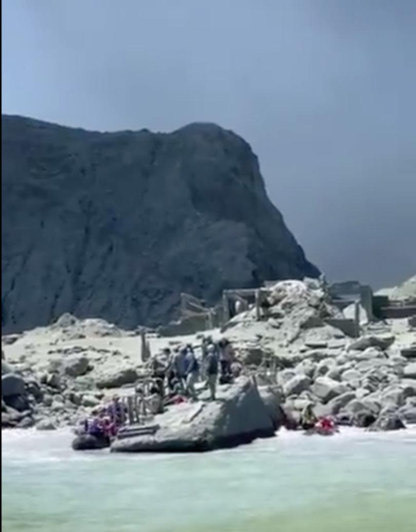 Tour operators rescue people minutes after the volcano on New Zealand's Whakaari.