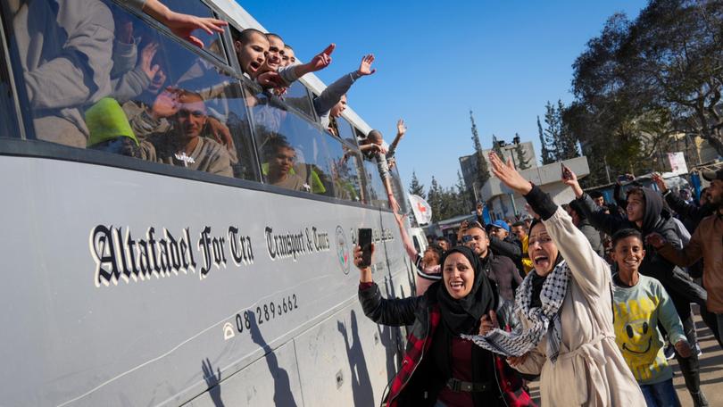 Freed Palestinian detainees are greeted after being released from an Israeli prison.