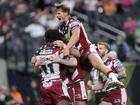 Sam Walters jumps onto Harry Smith after he scored against the Warrington Wolves.