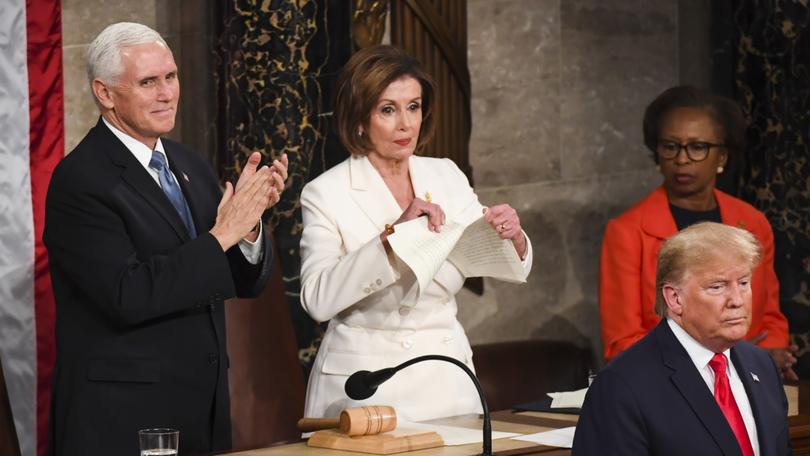 House Speaker Nancy Pelosi (D-California) tears up her advanced copy of President Donald Trump's State of the Union address at the end of the event on Feb. 4, 2020.