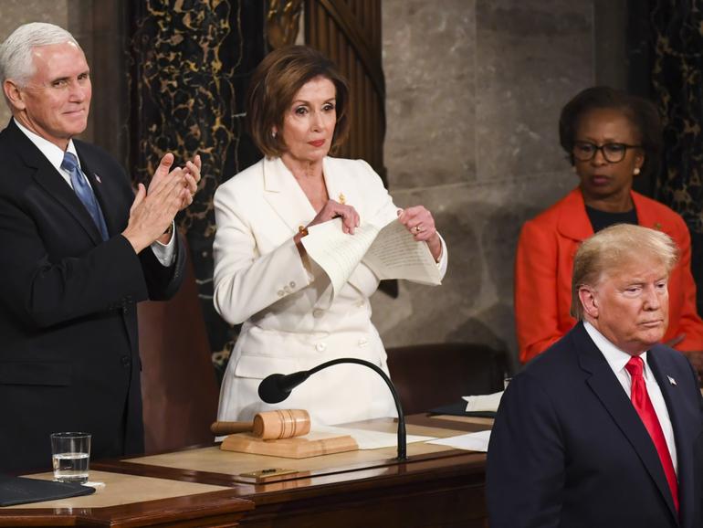 House Speaker Nancy Pelosi (D-California) tears up her advanced copy of President Donald Trump's State of the Union address at the end of the event on Feb. 4, 2020.