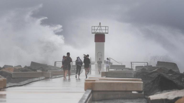 Swells along the Queensland coast are surging as Tropical Cyclone Alfred approaches. (Jono Searle/AAP PHOTOS)