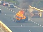 A car fire in the middle of a freeway in Melbourne’s southeast is causing traffic delays for morning commuters.