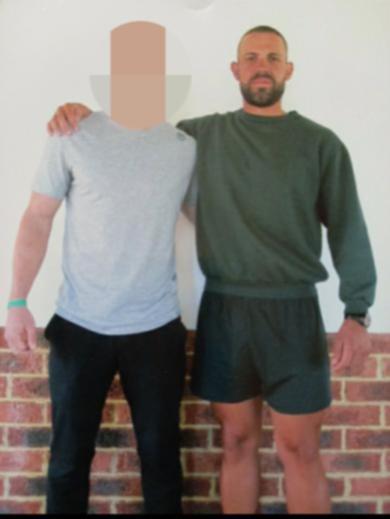 Ryan Peake (right) in his prison greens.