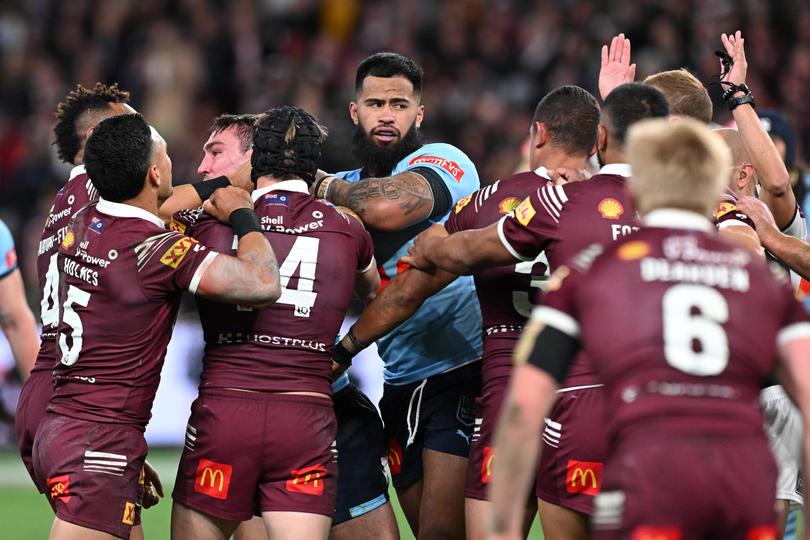 Players scuffle during game three of the 2024 State of Origin series.