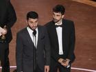 Rachel Szor, from left, Hamdan Ballal, Basel Adra, and Yuval Abraham accept the award for best documentary feature film for No Other Land during the Oscars in Los Angeles. 