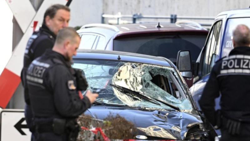 A car has struck people in the western German city of Mannheim, leaving two dead, authorities say.