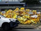 Residents queued for hours to get sandbags to secure their homes after a depot ran out of supplies. (Savannah Meacham/AAP PHOTOS)