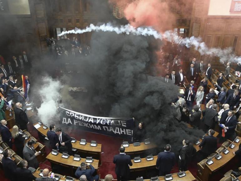 Opposition members of parliament have tossed smoke grenades and tear gas. (AP PHOTO)