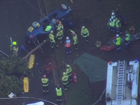 A man has been trapped in a crashed car in Sydney’s southwest.