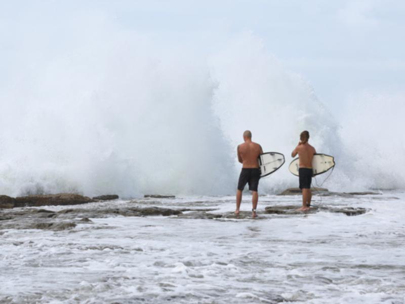 Coastal Queenslanders are on alert as Cyclone Alfred bears down, bringing high winds and tides.