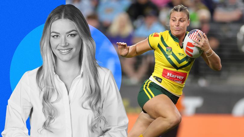 Jessica Sergis of Australia makes a break during the International Match between the Australia Jillaroos and England.
