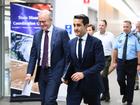 Prime Minister Anthony Albanese and Queensland Premier David Crisafulli arrive to a press conference at the Kedron State Emergency headquarters in Brisbane, Wednesday, March 5, 2025. (AAP Image/Jono Searle) NO ARCHIVING