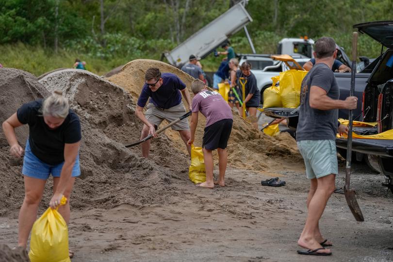 Residents fill sand bags on March 06, 2025 at Camp Hill in Brisbane, Australia.