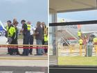 A man has allegedly attempted to board a plane in Melbourne while armed with a gun.