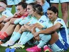 Australia's Sam Kerr, right, sits with her teammates following their loss to Sweden in the Women's World Cup third place playoff soccer match in Brisbane, Australia, Saturday, Aug. 19, 2023. (AP Photo/Tertius Pickard)