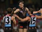 Will Day (centre) was instrumental as Hawthorn began the season with a resounding victory in Sydney. (Dean Lewins/AAP PHOTOS)