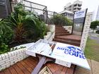 Damage seen outside an apartment building at Broadbeach on the Gold Coast, Saturday, March 8th, 2025. Ex-tropical cyclone is bringing heavy rainfall and damaging winds to south-east Queensland and northern New South Wales. (AAP Image/Dave Hunt) NO ARCHIVING