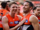 Lachie Whitfield and Toby Greene celebrate the Giants’ win.