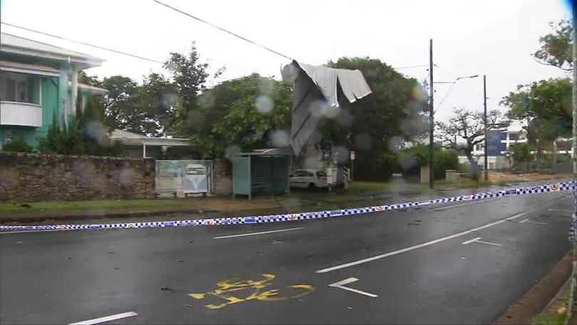 A man says he slept through ex-tropical cyclone Alfred tearing part of the roof from his Redcliffe home.