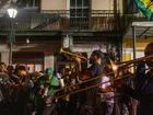 Nathan Scott, centre, and the New Groove Brass Band perform in the French Quarter in New Orleans after the Super Bowl in February. 