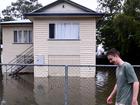 Renter Hayden Edwards is waiting for the water to subside to assess damage at his home. 