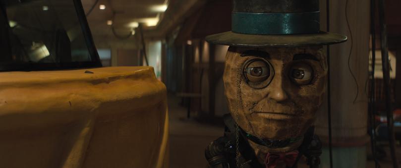 A Mr Peanut robot voiced by Woody Harrelson.