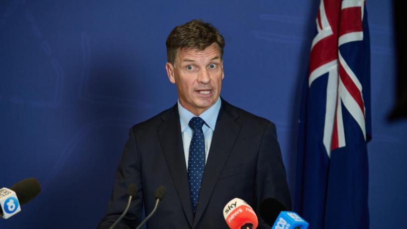 Shadow treasurer Angus Taylor has been in a running battle with his counterpart Jim Chalmers on falling living standards.