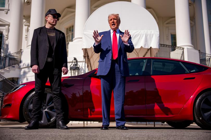 US President Donald Trump, accompanied by White House Senior Advisor, Tesla and SpaceX CEO Elon Musk, on the South Lawn of the White House.