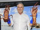 Federal Trade Minister Don Farrell with rock lobsters at Fremantle Fishing Boat Harbour.