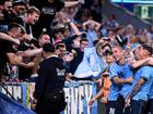 Sydney fans show their delight after Patryk Klimala (right) scored against Jeonbuk. (Dan Himbrechts/AAP PHOTOS)