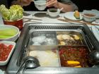 Chinese hotpot giant Haidilao said it would compensate thousands of customers who visited one of its outlets in Shanghai after two diners were captured on video urinating into hotpot broth.