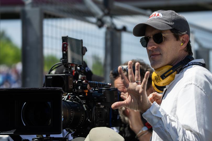 Joseph Kosinski on the set of F1.