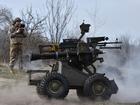 A Ukrainian serviceman operates a new ground drone at a military training ground in the Zaporizhzhia region.