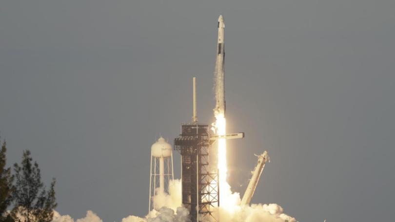 A SpaceX Falcon 9 rocket with a crew of four is on its way to the International Space Station. 