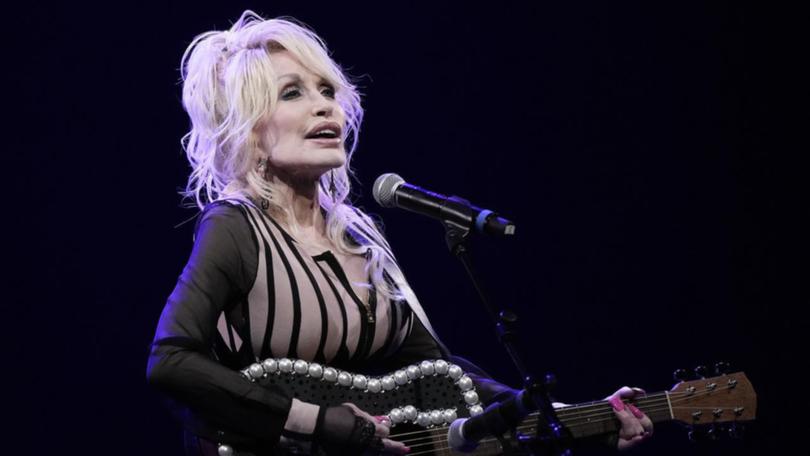 Dolly Parton says she will always love and miss Carl Dean, her husband of almost 60 years. (AP PHOTO)