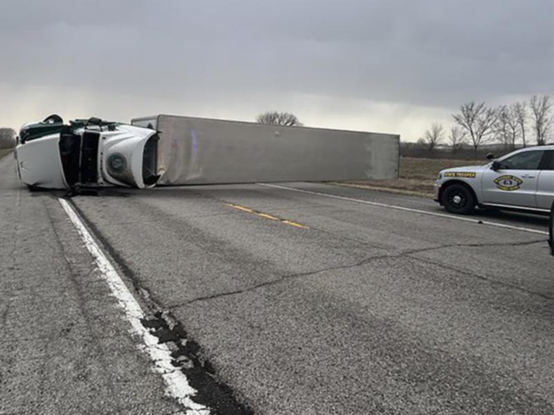 A massive storm sweeping the US has caused traffic chaos, fanned fires and damaged buildings. 