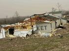 A home is damaged after a severe storm passed the area near Ozark County, Mo., early Saturday, March 15, 2025.